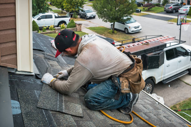 Professional Roofing technician working in Harwood, TX
